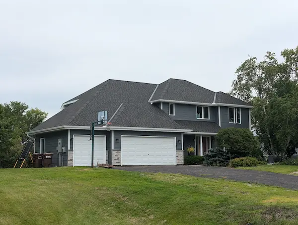 Storm restoration project with roof, siding, and gutters replacement