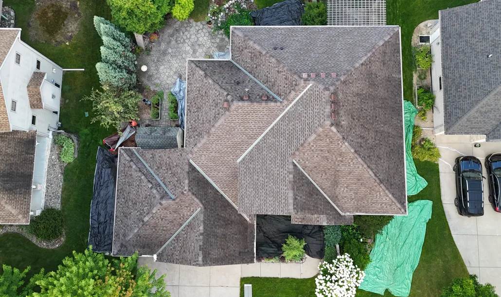 Before insurance claim roof replacement in Maple Grove