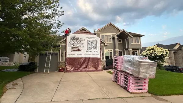 Completed Owens Corning Williamsburg Gray shingle roof replacement on a Maple Grove, MN home
