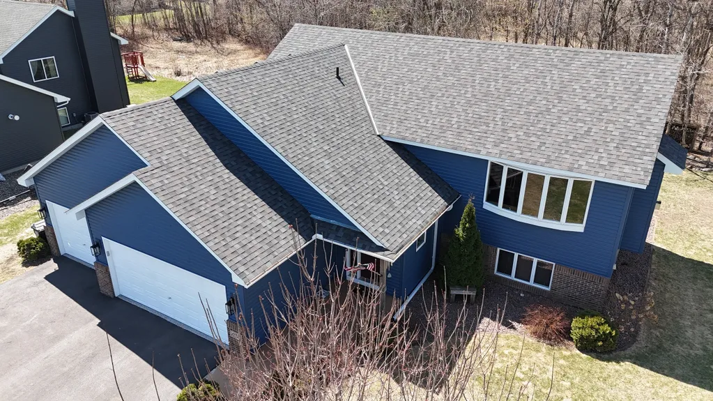 Residential roof replacement with charcoal architectural shingles