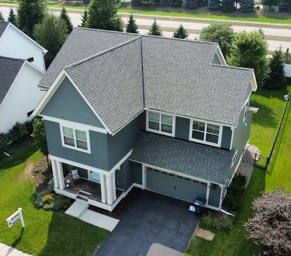 Roof replacement with charcoal colored architectural shingles