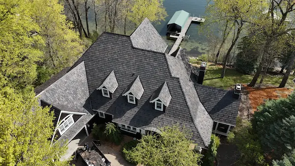 Architectural roof replacement with synthetic slate shingles